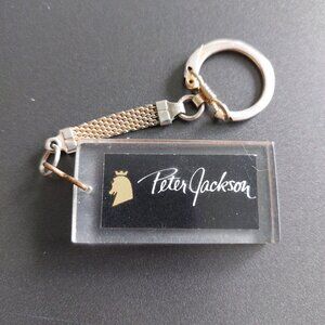 vintage Peter Jackson/$10,000 keyring/zipper pull